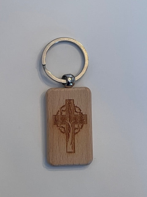 Wooden keychain with engraved design